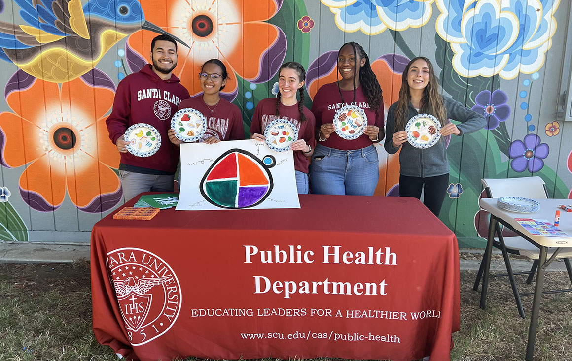 Students from the public health department pose at local health fair. Group of students from SCUs Public Health Department pose at event.